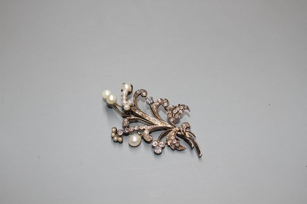 An early-mid 20th century yellow metal, cultured pearl and diamond set floral spray brooch,